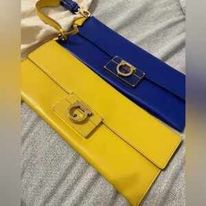 Salvatore Ferragamo Blue and Yellow Leather Afef Gancio
Clutch Wristlet!